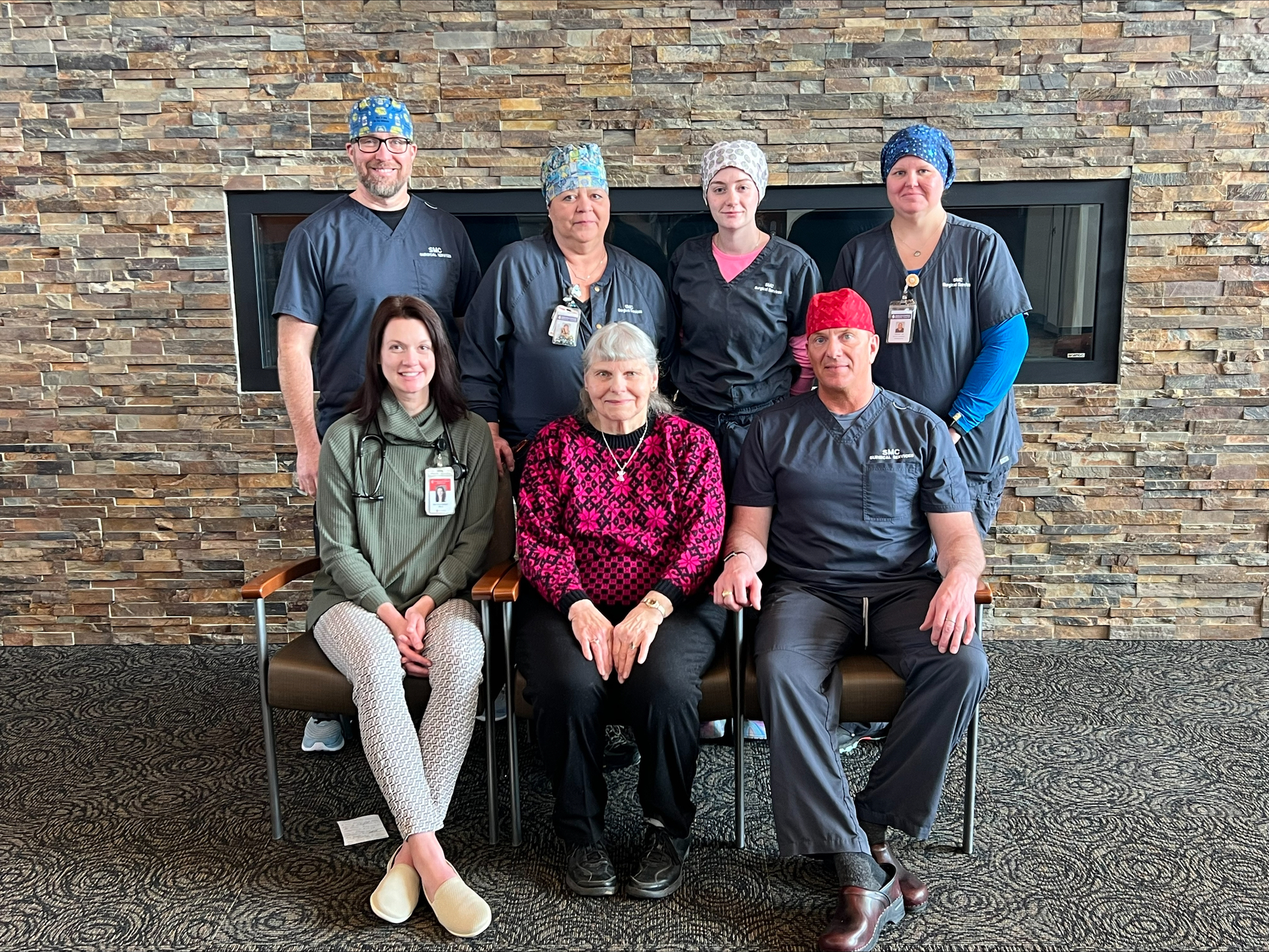 Pictured (front row left to right): Keri Baumberger, PA-C at CCCHC; Sarah Richau; and Dr. Michael L. Schmit, SMC Staff Surgeon. Back row left to right: Carl Miller, CRNA; Janel Roshau, LPN; Olivia Weisz, CST; and Destiny Chapman, RN/Operating Room Coordinator